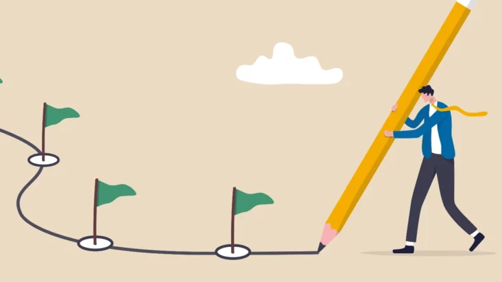 businessman-with-pencil-drawing-a-product-roadmap